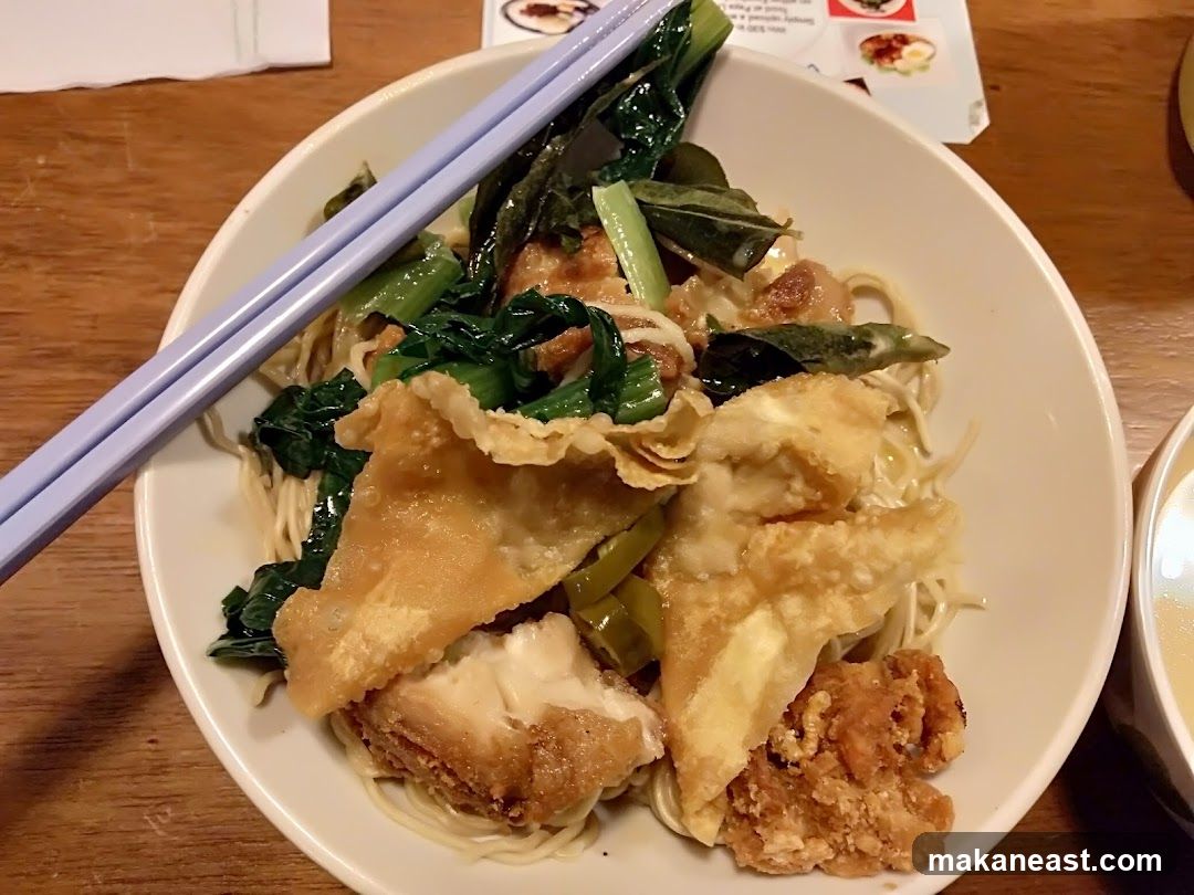 Noodle Dish with Fried Wontons and Greens