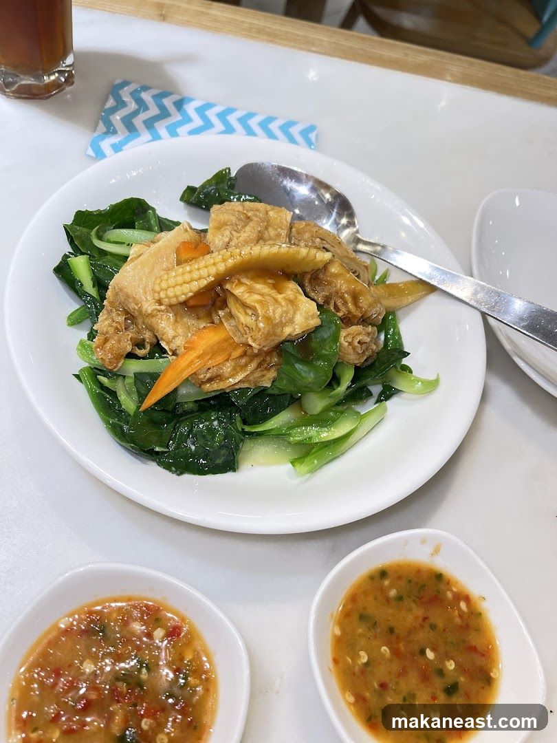 Stir-fried vegetables with tofu and baby corn