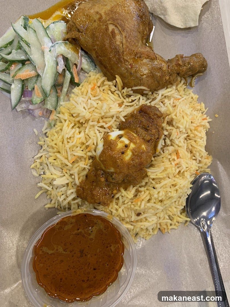 Chicken Biryani with Side Salad and Curry