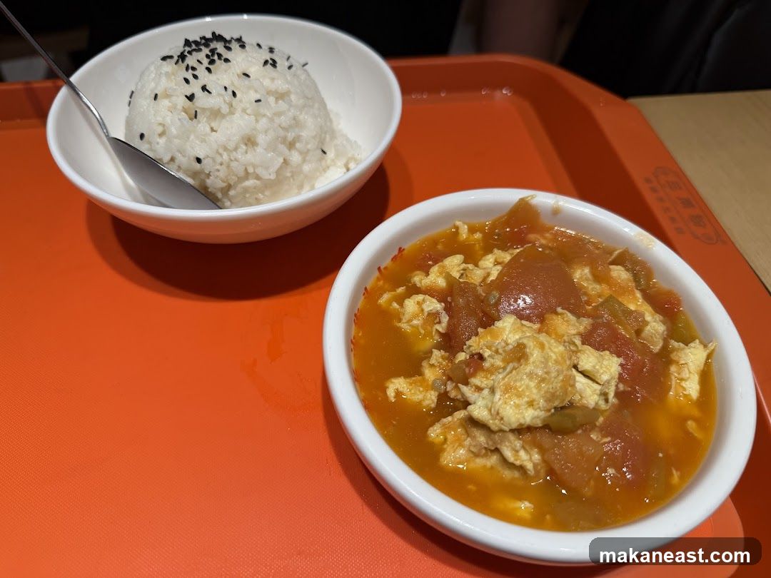 Scrambled Eggs with Tomatoes and Rice
