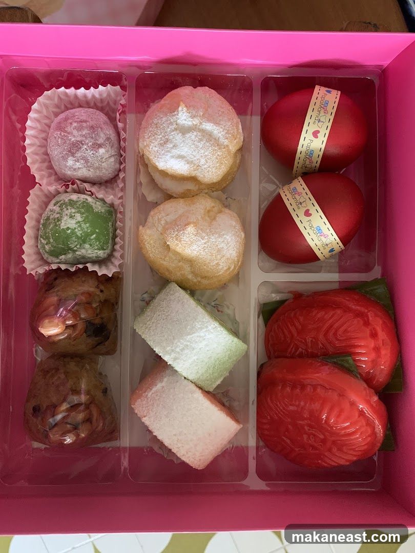 Assorted Desserts in a Pink Box