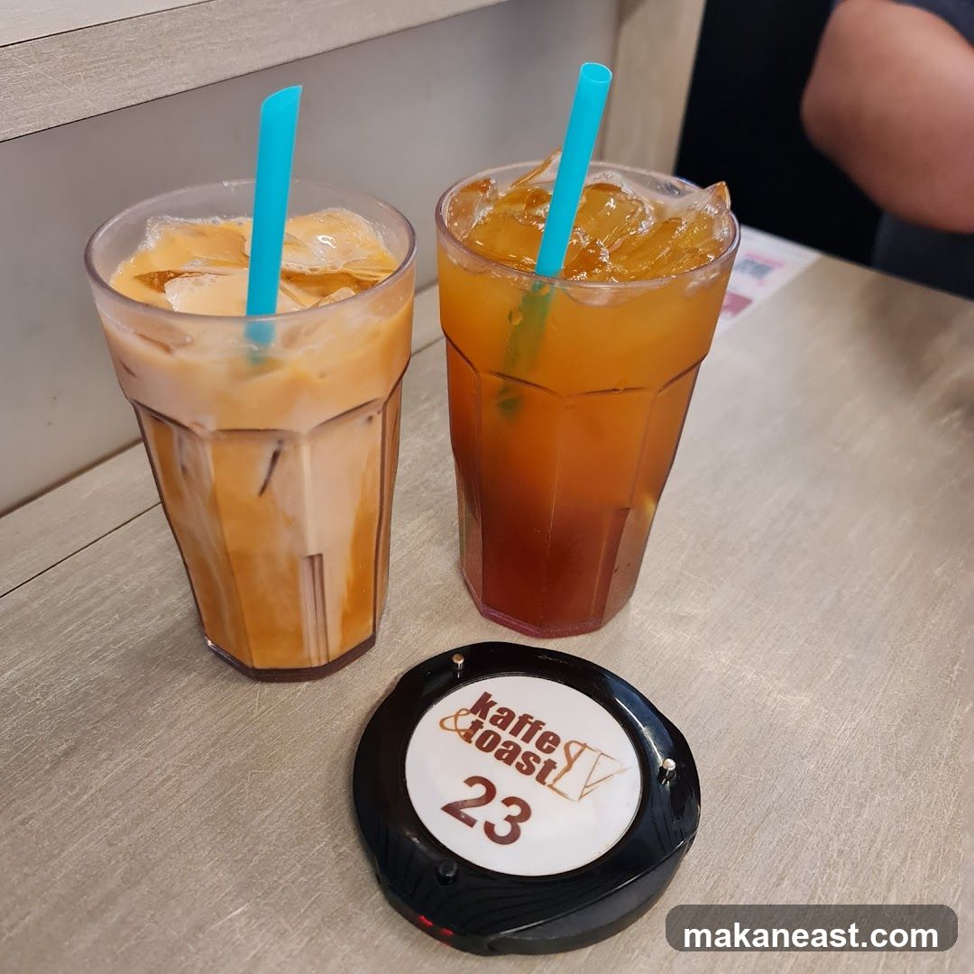 Two Iced Drinks and a Table Number