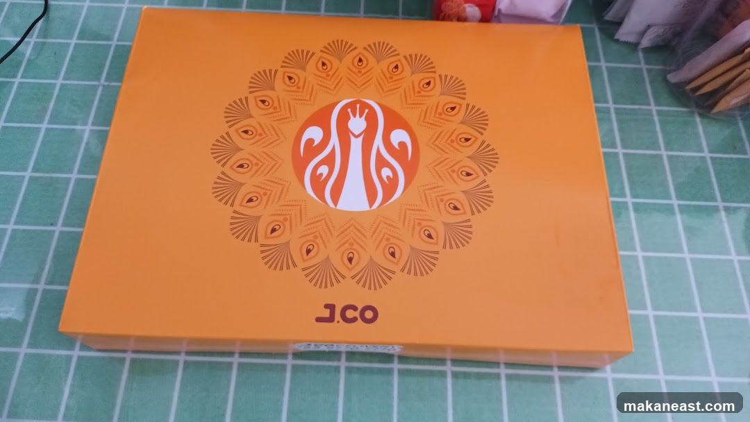 Orange Box with Peacock Design