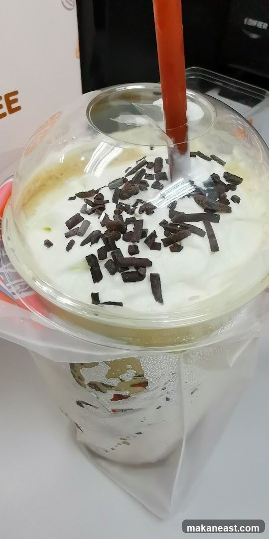 Iced Coffee with Whipped Cream and Chocolate Shavings