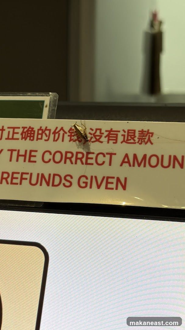 Sign with text and insect