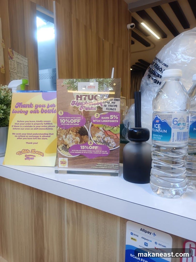 Counter with promotional flyers and water bottles