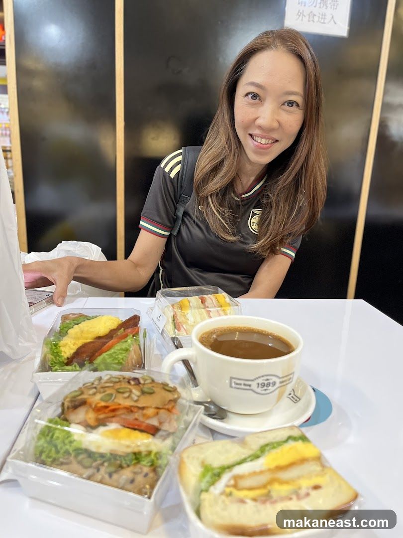 Woman with sandwiches and coffee