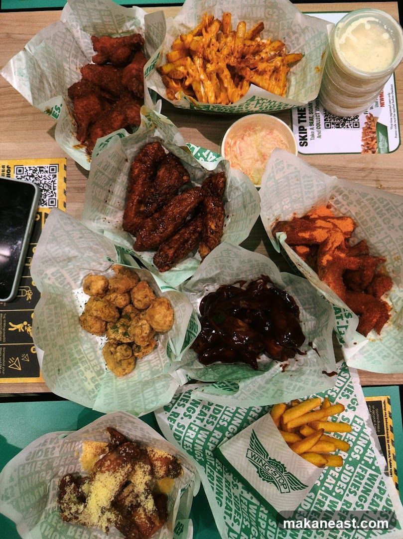Assortment of Chicken Wings and Fries
