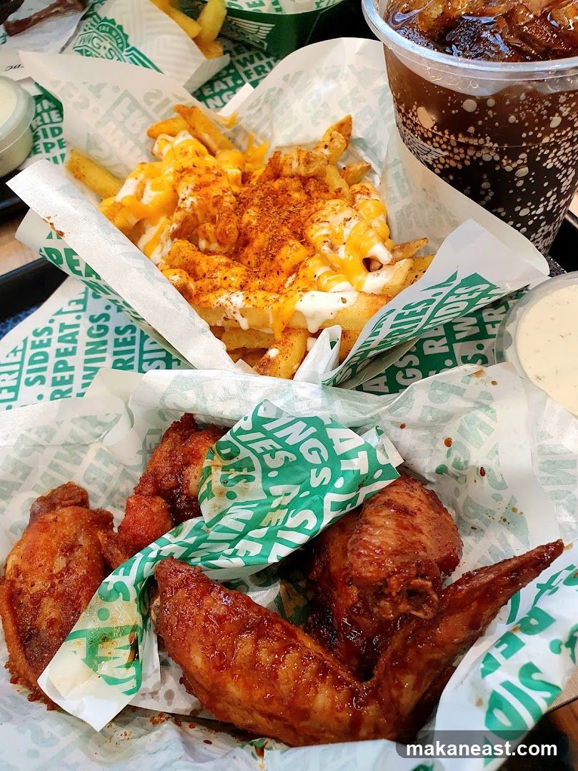 Chicken wings and fries