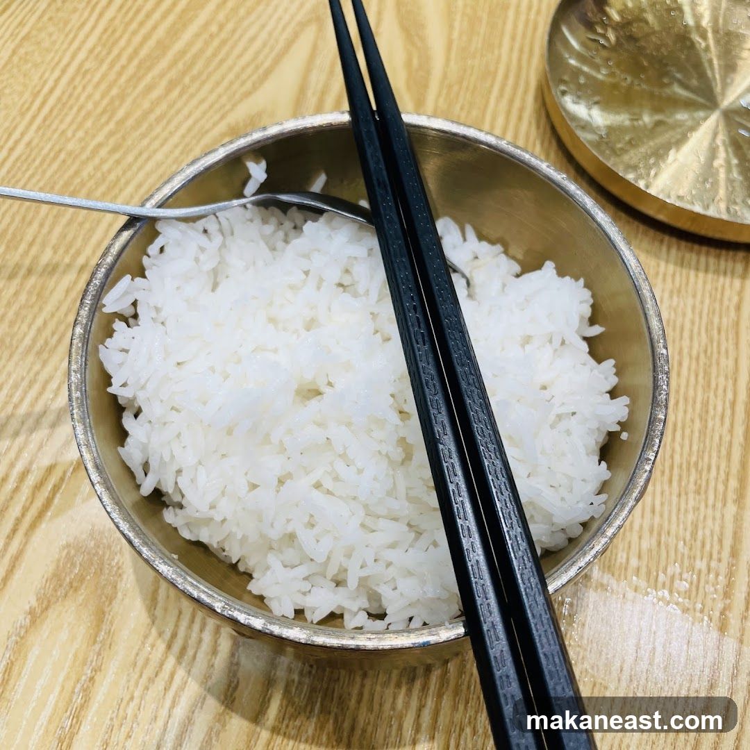 Bowl of Rice with Chopsticks