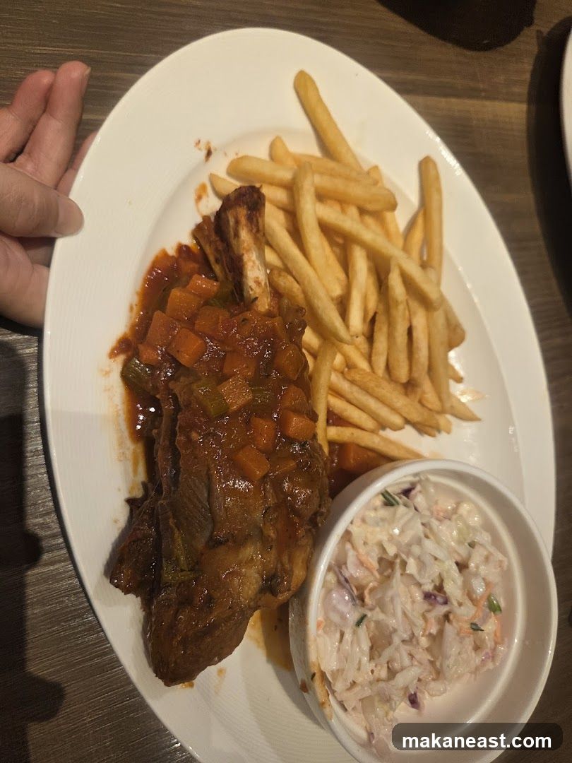 Braised Meat Dish with Fries and Coleslaw