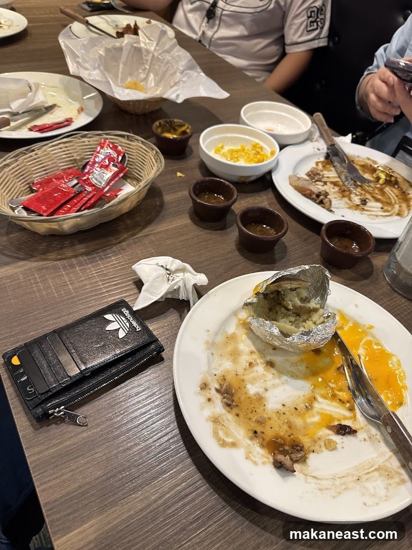 Table with leftover food and wallet