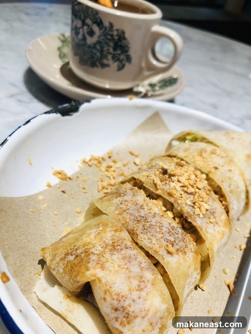 Rolled Crepe with Peanuts and Coffee