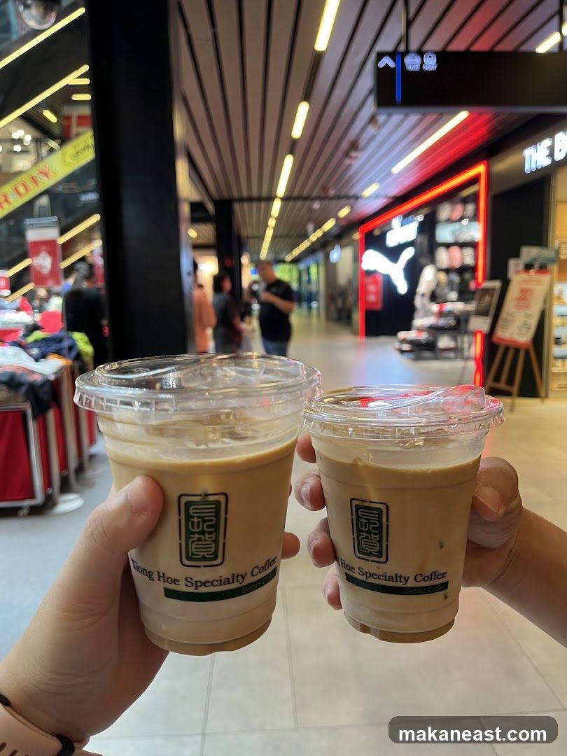 Two iced coffees in a mall