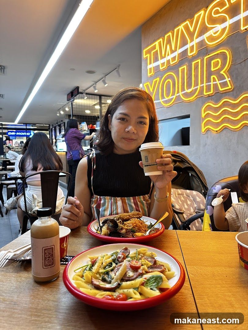 Woman holding a coffee cup at a restaurant