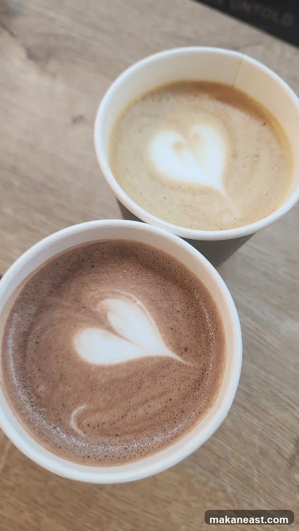Two coffees with latte art