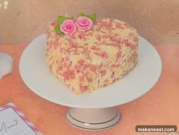 Heart-shaped cake with ham and cheese topping