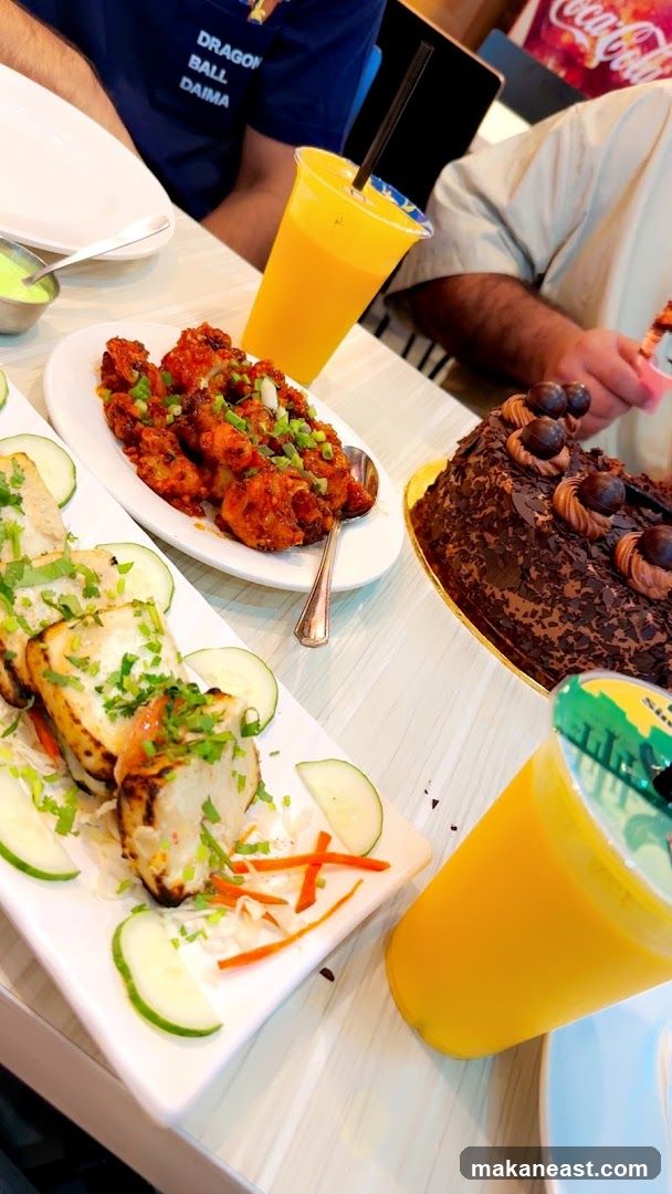 Restaurant Table with Food and Drinks