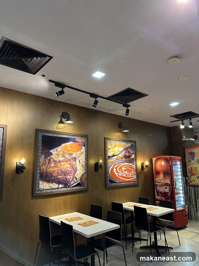 Restaurant Interior with Food Art and Coca-Cola Fridge