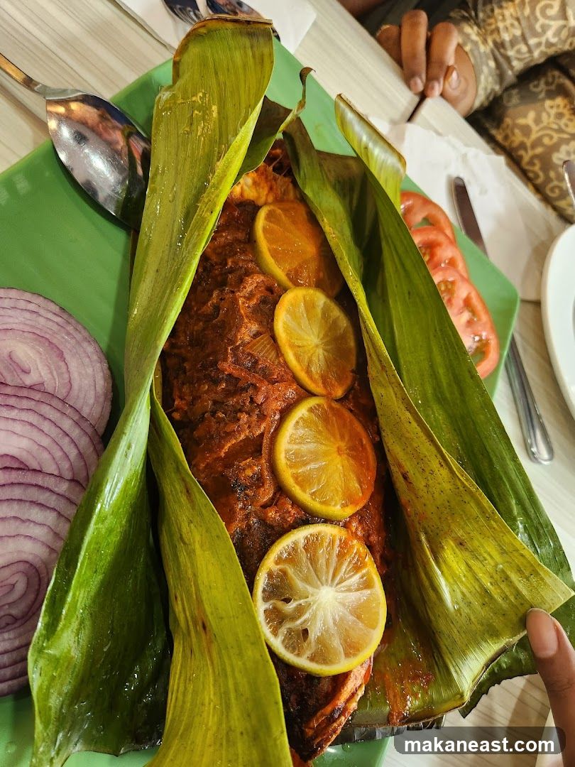 Fish dish with lemon slices and onion