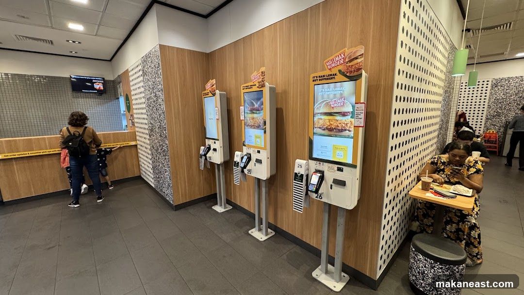 Self-order kiosks in a fast-food restaurant