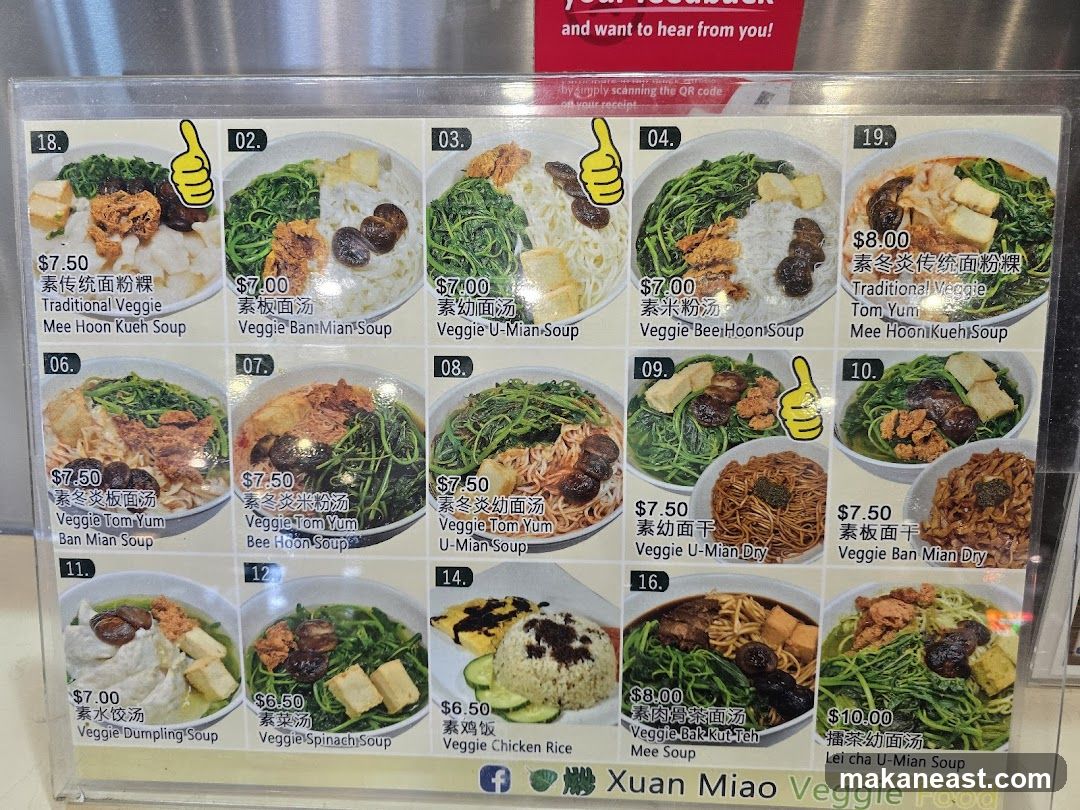 A menu displaying various vegetarian noodle and soup dishes with prices.