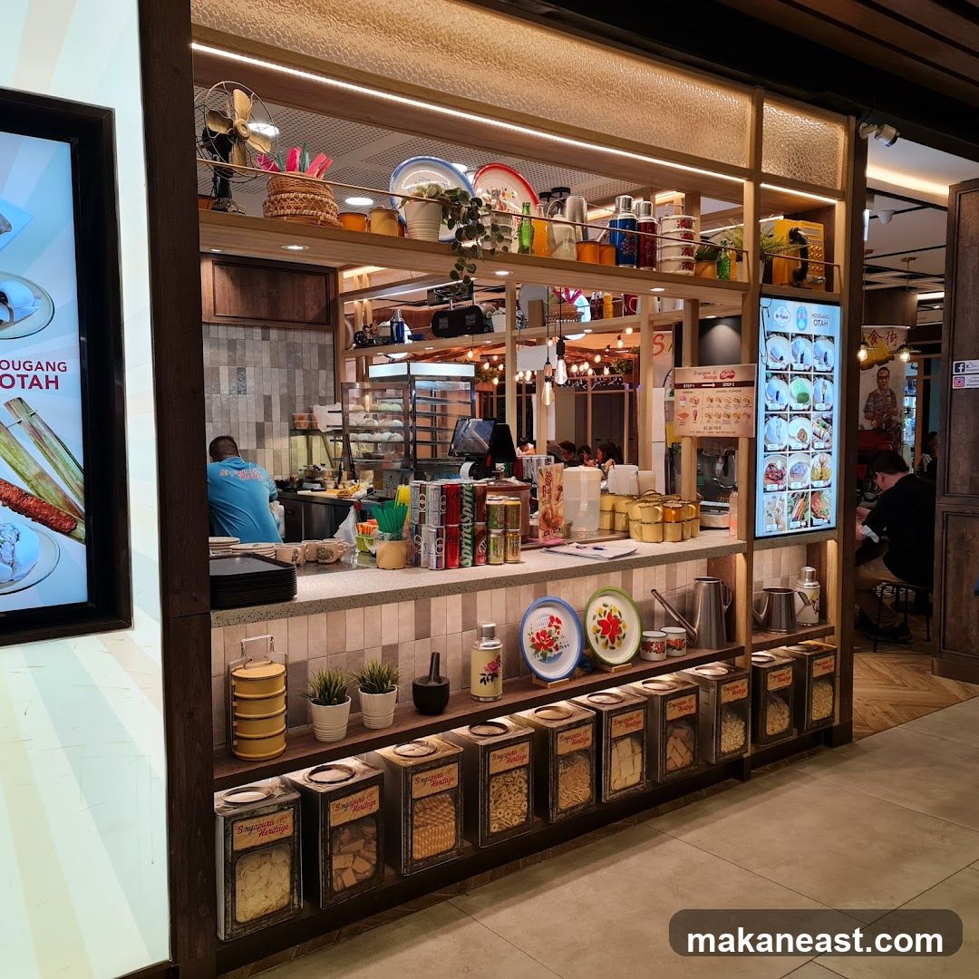 Food stall with display of snacks and menu board