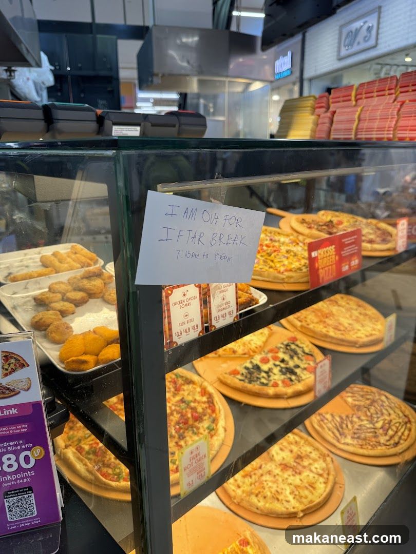 Pizza display with a sign