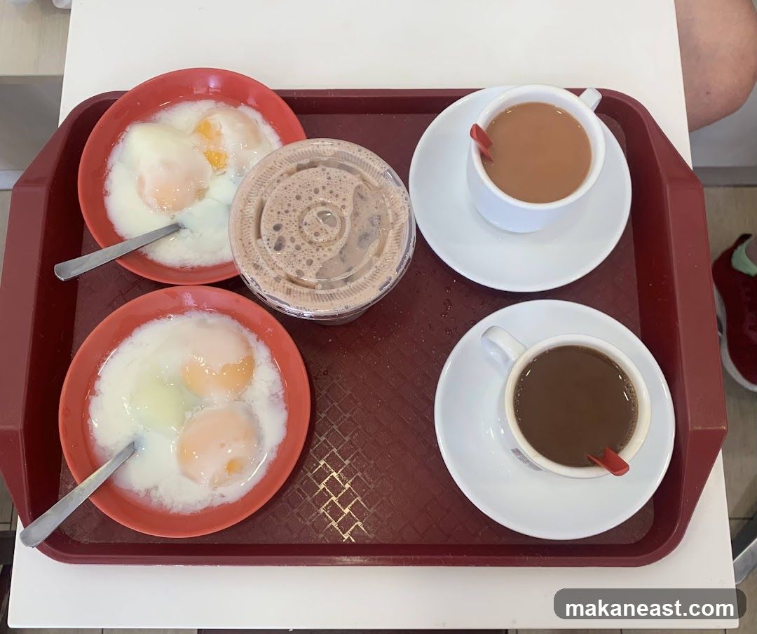 Breakfast Tray with Soft-Boiled Eggs and Drinks
