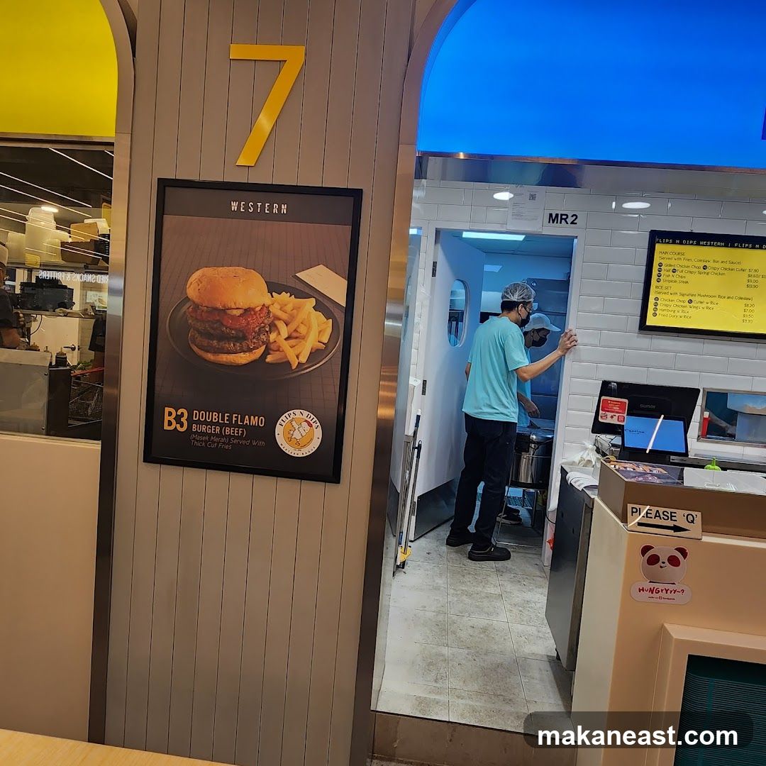 Food stall with menu and staff