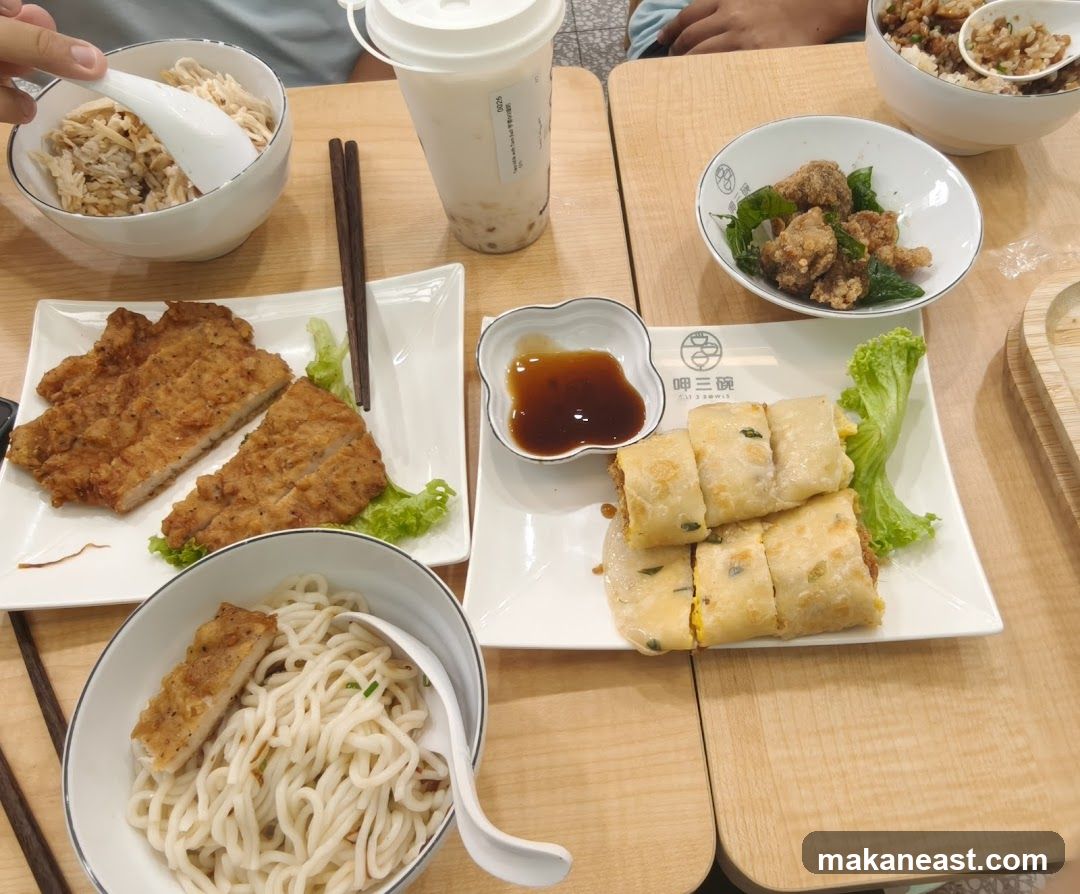 Table with various Taiwanese dishes