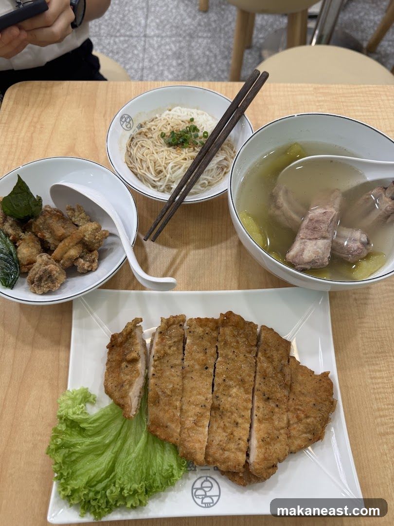Meal with Pork Chop, Noodles, and Soup