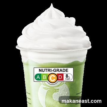 Green beverage with whipped cream and Nutri-Grade label