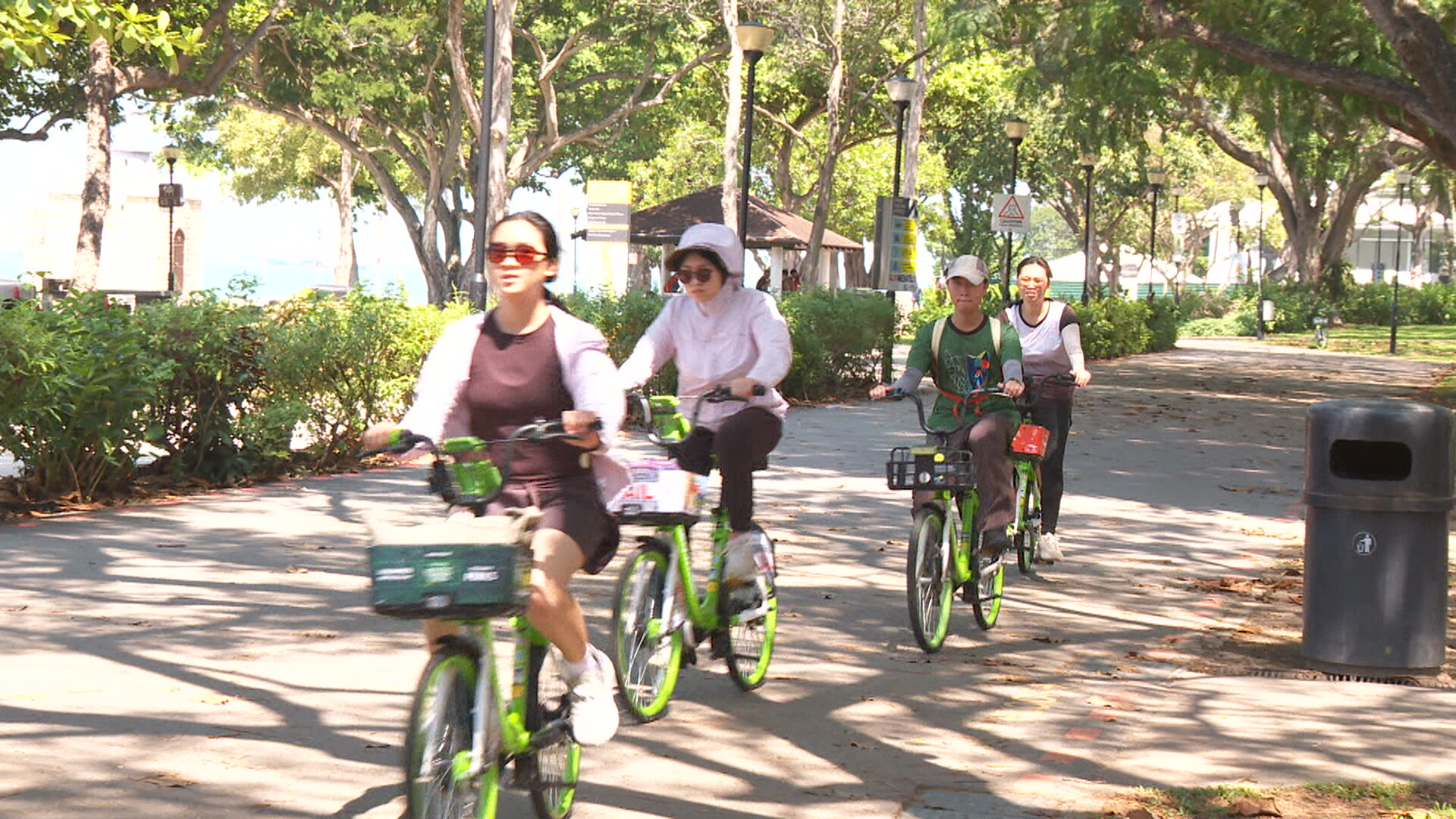 Cyclists on the East Coast Park path near East Coast Lagoon Food Village
