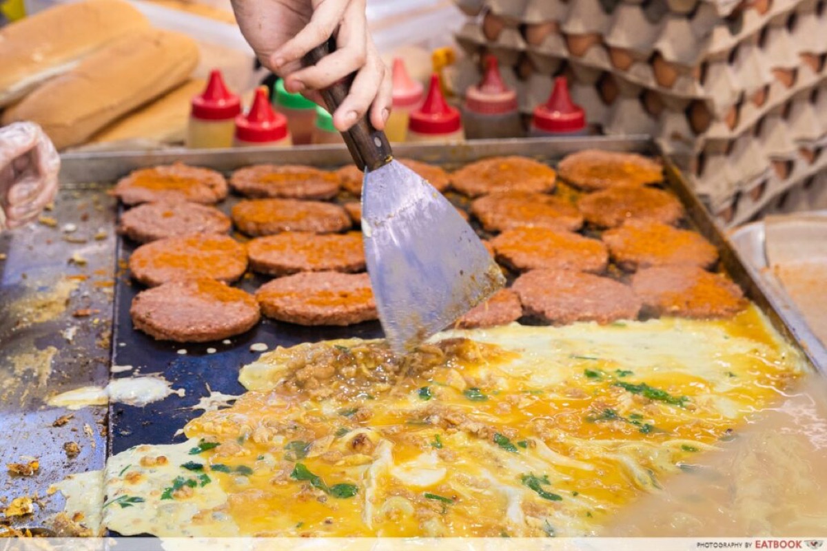 Ramly burger stall prep at the Tampines MRT food bazaar